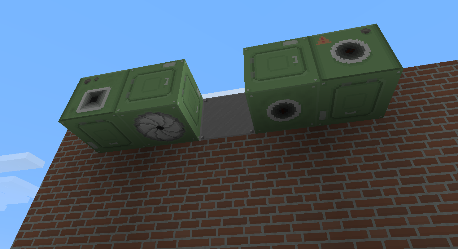 dropper and dispenser, facing two ways each, and brick wall