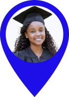 Young woman with curly hair wearing a black graduation gown and cap, smiling.