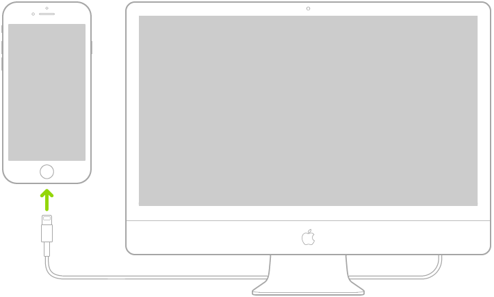 iPhone collegato a un Mac mediante un cavo USB.