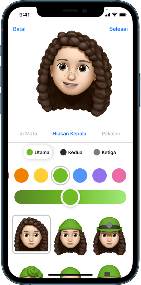 Skrin cipta Memoji menunjukkan watak sedang dicipta di bahagian atas, ciri untuk menyesuaikan di bahagian bawah watak, kemudian di bawahnya, pilihan untuk ciri yang dipilih. Butang Selesai berada di bahagian kanan atas dan butang Batal berada di bahagian kiri atas.