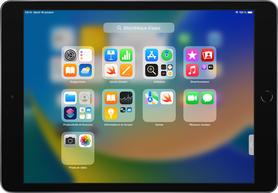 La bibliothèque d’apps sur l’iPad montrant les apps organisées par catégorie (Utilitaires, Divertissement, « Productivité et finances », etc.).