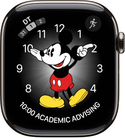 L’esfera Mickey Mouse, en la qual pots afegir moltes complicacions. Mostra tres complicacions: Missatges a la part superior esquerra, Entrenament a la part superior dreta, i la data a la part inferior.