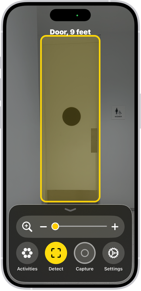 The Magnifier app is open and a door is being detected. A description shows how far away the door is.