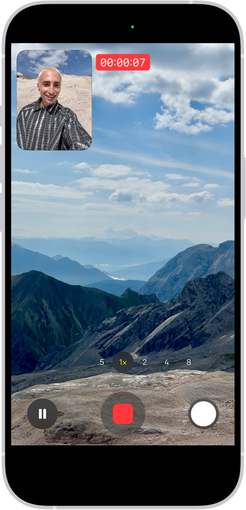 Camera në modalitetin Video duke regjistruar një video me Dual Capture. Një dritare në pjesën e sipërme të majtë të kuadrit shfaq atë që po regjistron kamera e përparme, dhe pjesa tjetër e kuadrit shfaq atë që po regjistron kamera e pasme.