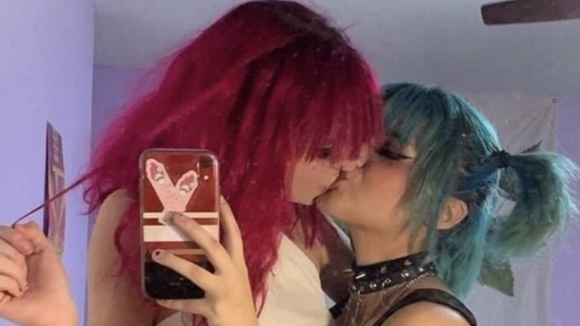 Red Hair Girl and Blue Hair Girl Making Out meme.
