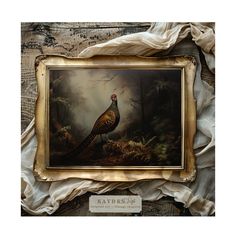 a painting of a pheasant on display in a gold frame with white ruffled fabric around it