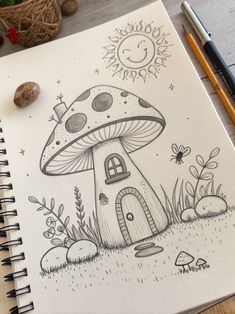 a drawing of a mushroom house in the grass