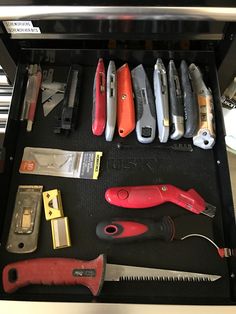 a drawer filled with different types of tools