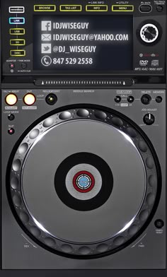 a dj's turntable sitting on top of a black table with buttons and numbers