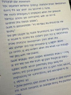 a handwritten poem in blue ink on a white sheet of paper with writing underneath it