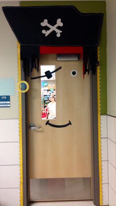 an open door with a pirate face on it