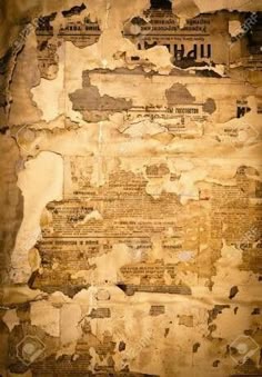 an old paper with some torn up papers on it