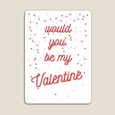 the words would you be my valentine written in red ink on a white card with confetti sprinkles