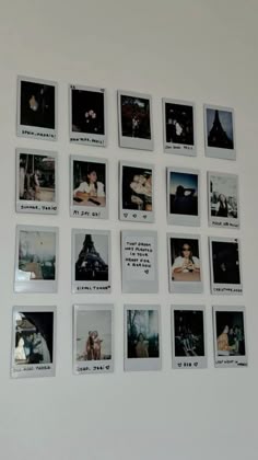 a white wall with many pictures on it