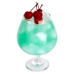 a green drink with cherries in it