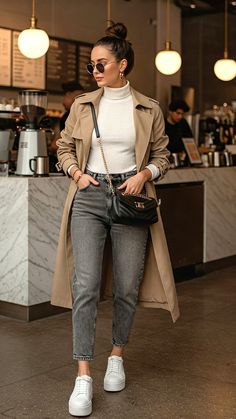 effortlessly chic spring outfits  ，effortlessly chic aesthetic with elegant layering, neutral tones, and a relaxed yet sophisticated vibe.effortlessly chic spring outfits  ，effortlessly chic aesthetic with elegant layering, neutral tones, and a relaxed yet sophisticated vibe.lightweight taupe trench coat over a fitted white turtleneck.  grey-washed high-waisted relaxed jeans and white platform sneakers. Beige Neutral Outfit, Gray And Cream Outfit, Taupe Trench Coat Outfit, Beige Turtleneck Outfit, Cream Trench Coat Outfit, Chic Jean Outfits, Tendances Mode Automne, Winter Fashion Outfits Casual, Stylish Work Outfits