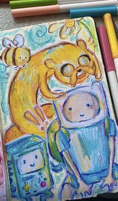 a child's drawing of an astronaut and his teddy bear on a notebook with colored crayons