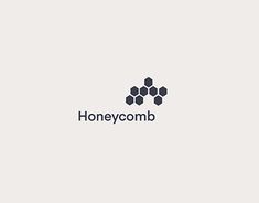 the logo for honeycomb is shown in black and white, with hexagonal shapes