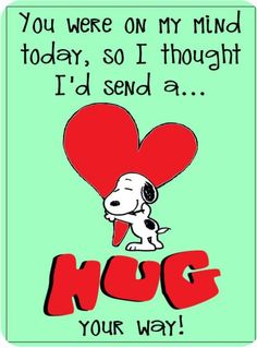 a dog holding a heart with the words hug your way
