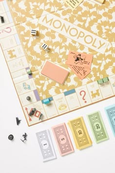 the board game monopoly is laid out and ready to be played