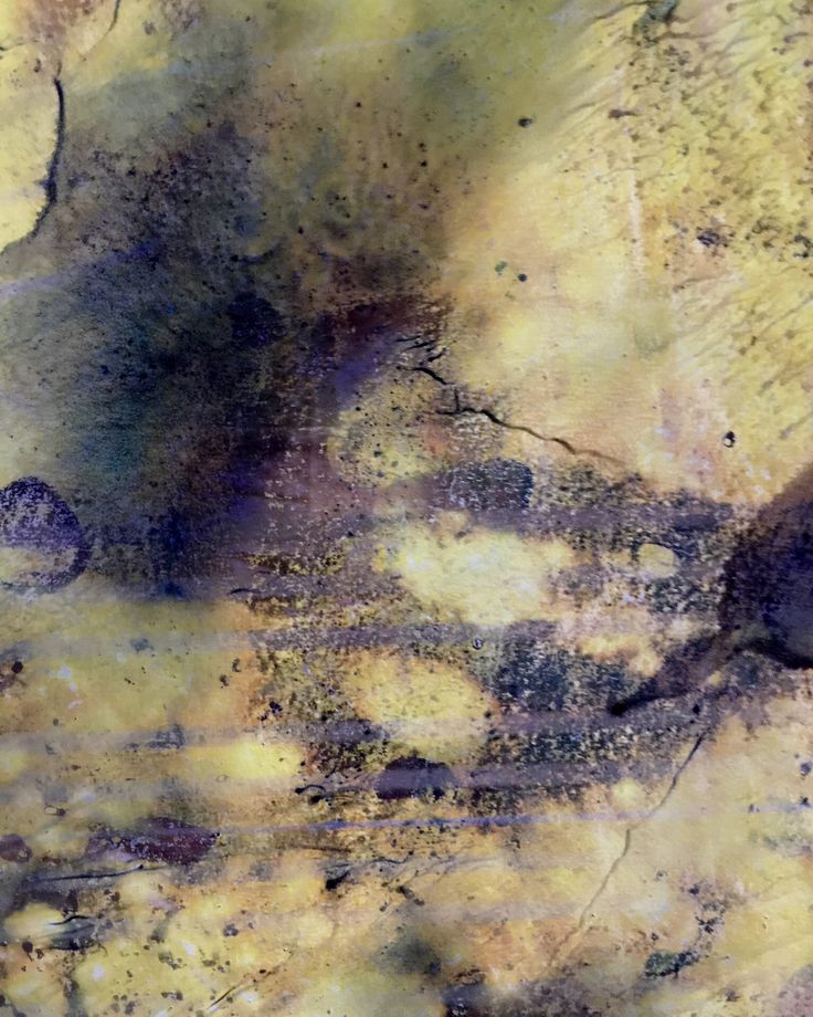 an abstract painting with different colors and shapes on it's surface is shown in this image