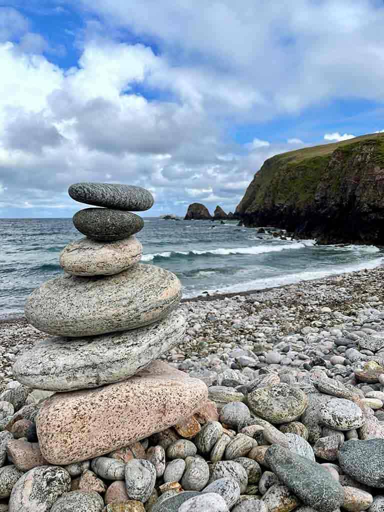 HOME 2 A stack if Lewisean Gneiss stones on the Aird Beach
