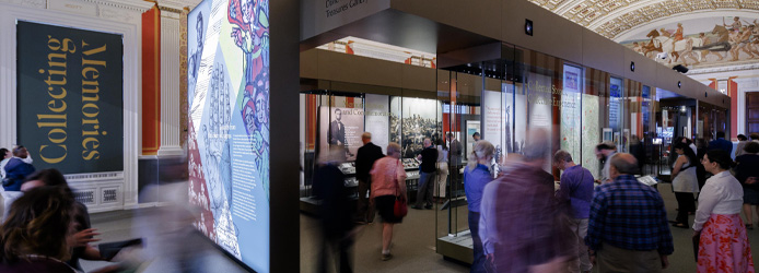 visitors exploring the Collecting Memories exhibit in the Thomas Jefferson Building of the Library of Congress