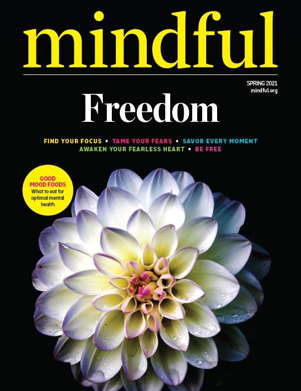 # Alt text: Mindful magazine cover featuring the theme "Freedom" with a white and yellow dahlia flower.