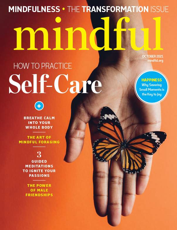 # Alt Text Magazine cover for "Mindful" featuring a person's hand with a butterfly, highlighting self-care practices.